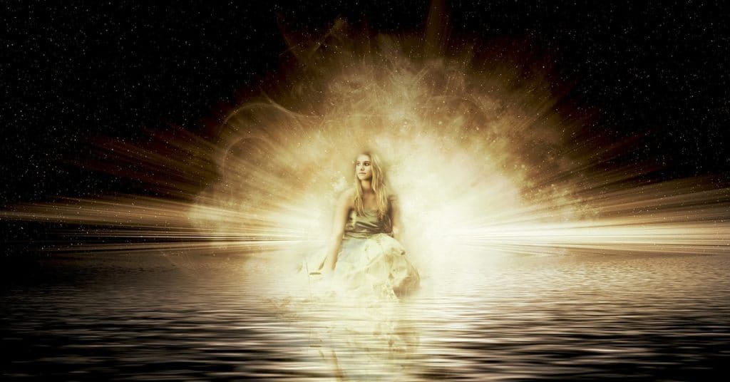 Woman in sea with spiritual power behind her